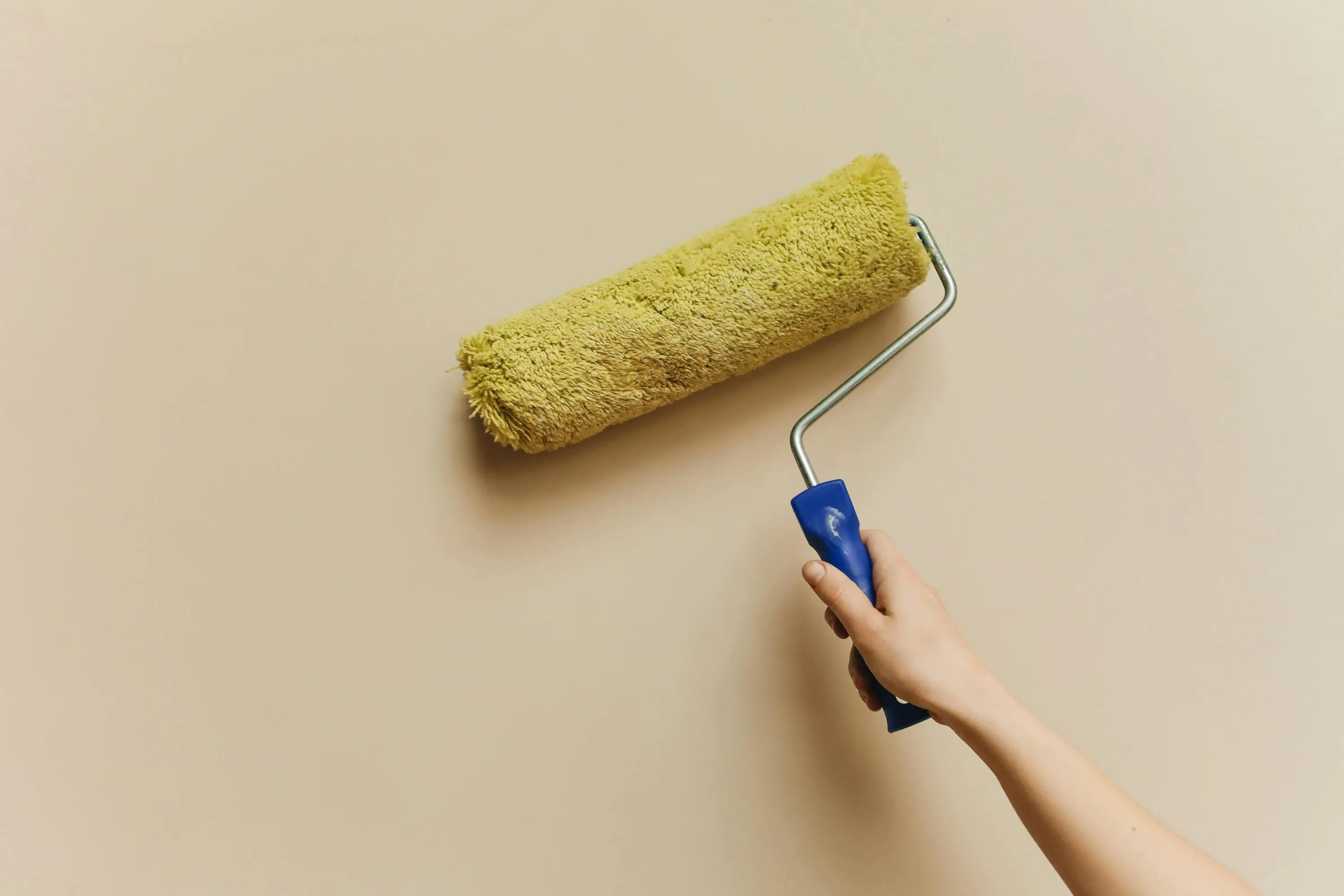 Painting a ceiling with a roller